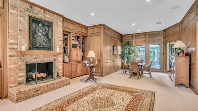 4708 Shady Ridge Ct, Fort Worth, TX 76109 - sitting room with carpet floors, recessed lighting, a decorative wall, a fireplace, and built in shelves