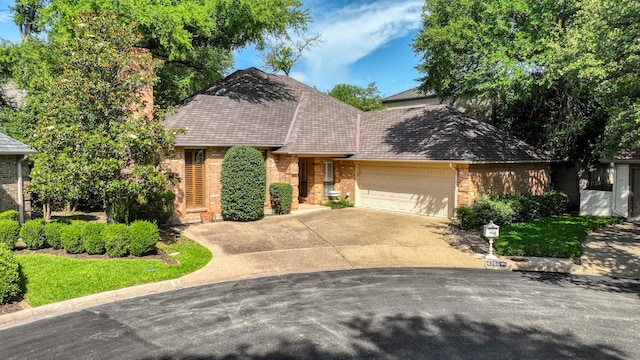 4708 Shady Ridge Ct, Fort Worth, TX 76109 - view of front of house featuring brick siding, a garage, and concrete driveway