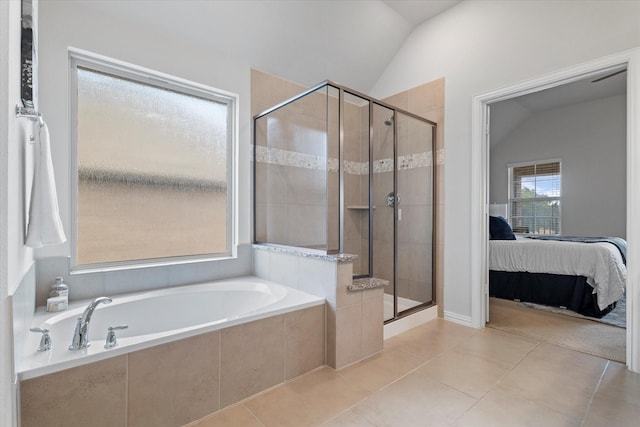 2451 S Gate Dr, Richardson, TX 75080 - full bathroom featuring a bath, a shower stall, tile patterned flooring, ensuite bath, and lofted ceiling