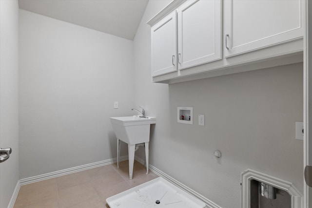 2451 S Gate Dr, Richardson, TX 75080 - laundry area featuring cabinet space, hookup for a washing machine, baseboards, and hookup for a gas dryer