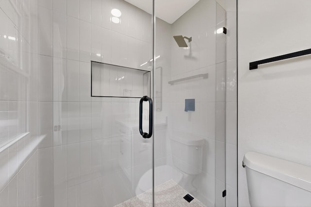 909 Dover Cir, Gainesville, TX 76240 - bathroom featuring toilet and a shower stall