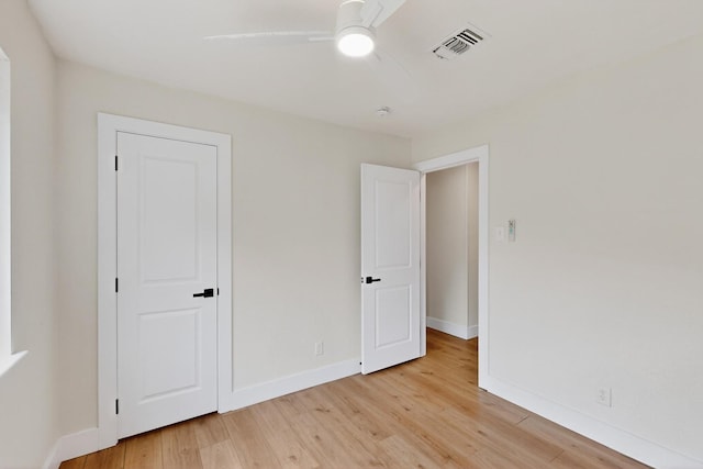 909 Dover Cir, Gainesville, TX 76240 - unfurnished bedroom with light wood-type flooring, baseboards, and a ceiling fan