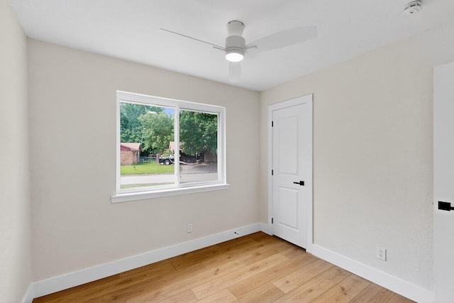 909 Dover Cir, Gainesville, TX 76240 - spare room featuring a smoke detector, baseboards, light wood-type flooring, and ceiling fan