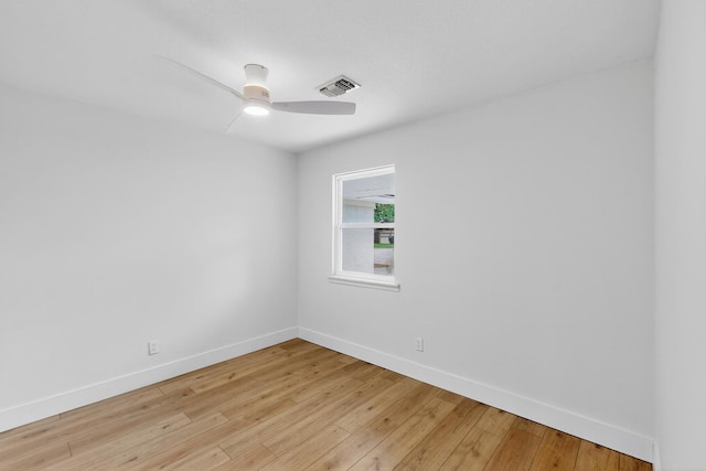 909 Dover Cir, Gainesville, TX 76240 - unfurnished room featuring baseboards, light wood-style flooring, and a ceiling fan