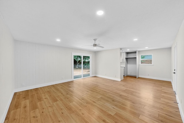 909 Dover Cir, Gainesville, TX 76240 - unfurnished living room featuring ceiling fan, light wood-style floors, recessed lighting, and baseboards