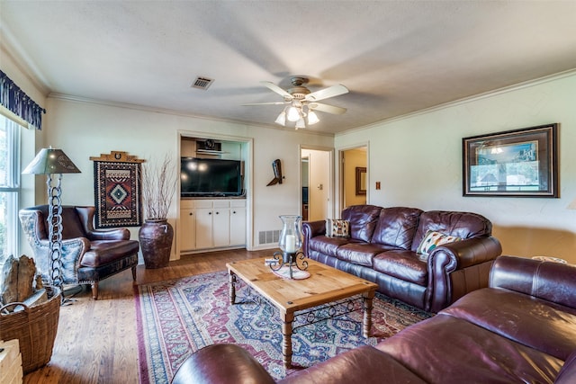 5501 Kara Ln, Parker, TX 75002 - living area with a ceiling fan, crown molding, and wood finished floors