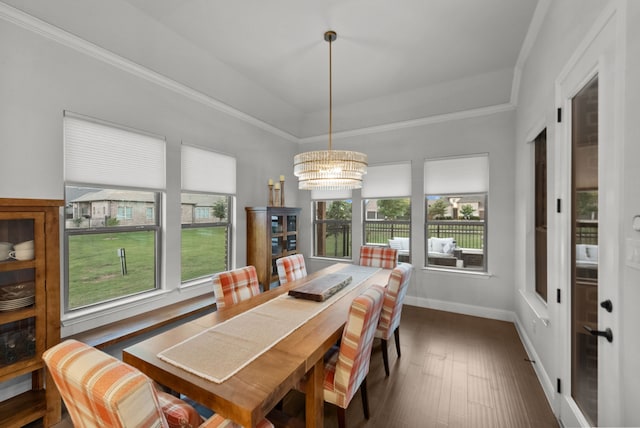 7800 Kentmere, The Colony, TX 75056 - dining space with a chandelier, wood finished floors, ornamental molding, baseboards, and a tray ceiling