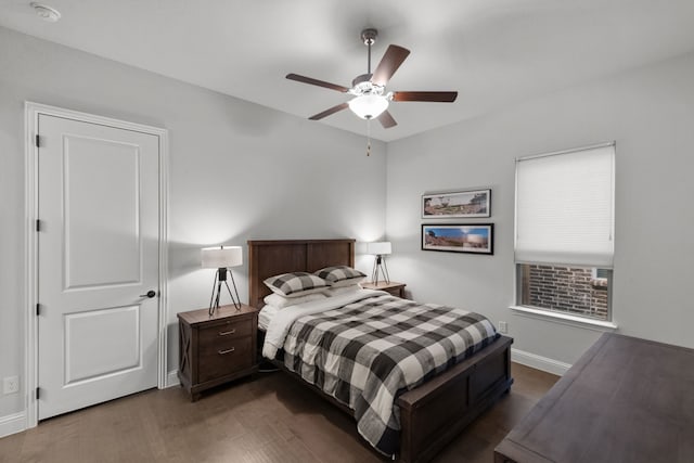 7800 Kentmere, The Colony, TX 75056 - bedroom with dark wood finished floors, baseboards, and ceiling fan