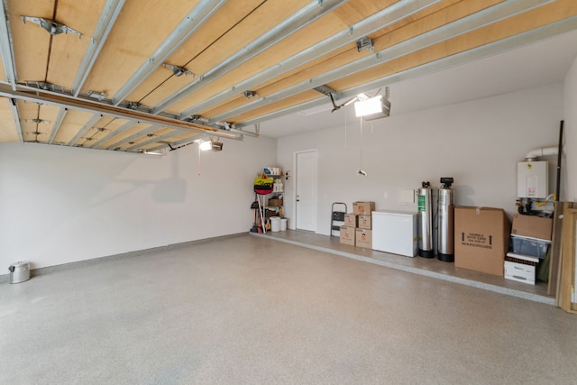 7800 Kentmere, The Colony, TX 75056 - garage featuring a garage door opener and refrigerator