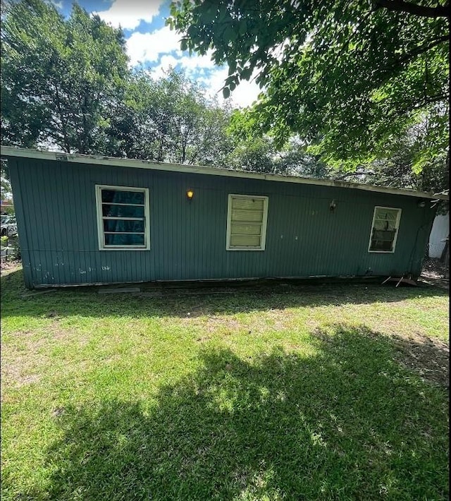 1303 N Galloway Ave, Mesquite, TX 75149 - view of side of property featuring a lawn