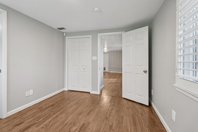 3620 W Biddison St, Fort Worth, TX 76109 - unfurnished bedroom featuring wood finished floors, a closet, and baseboards