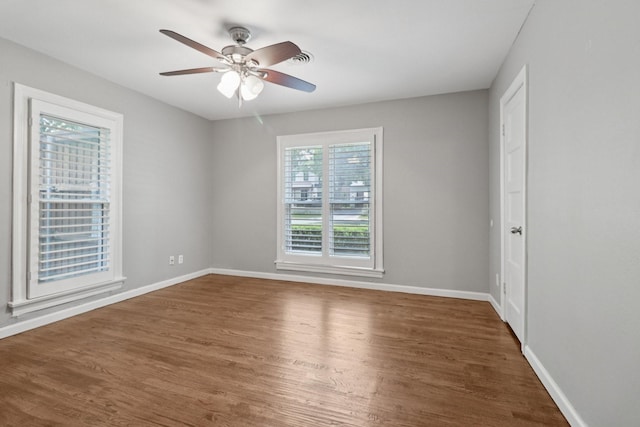 3620 W Biddison St, Fort Worth, TX 76109 - empty room featuring wood finished floors, a ceiling fan, and baseboards