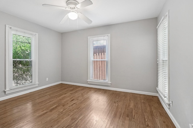3620 W Biddison St, Fort Worth, TX 76109 - empty room with healthy amount of natural light, wood finished floors, baseboards, and ceiling fan