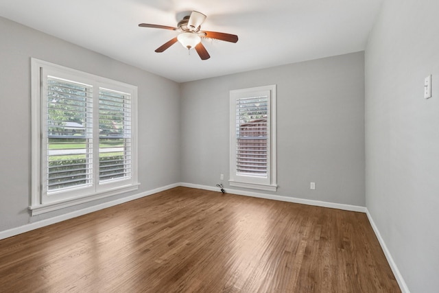 3620 W Biddison St, Fort Worth, TX 76109 - unfurnished room featuring healthy amount of natural light, wood finished floors, baseboards, and a ceiling fan