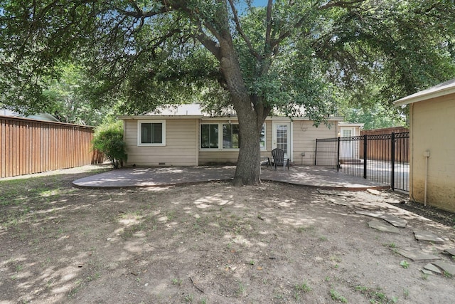 3620 W Biddison St, Fort Worth, TX 76109 - rear view of property with a fenced backyard and a patio