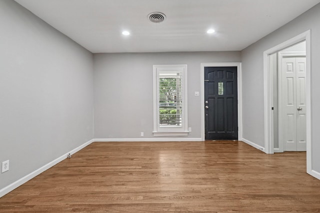 3620 W Biddison St, Fort Worth, TX 76109 - foyer entrance with wood finished floors, baseboards, and recessed lighting