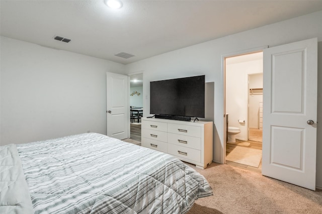 3113 Harper St, Little Elm, TX 75068 - bedroom featuring light colored carpet and ensuite bath