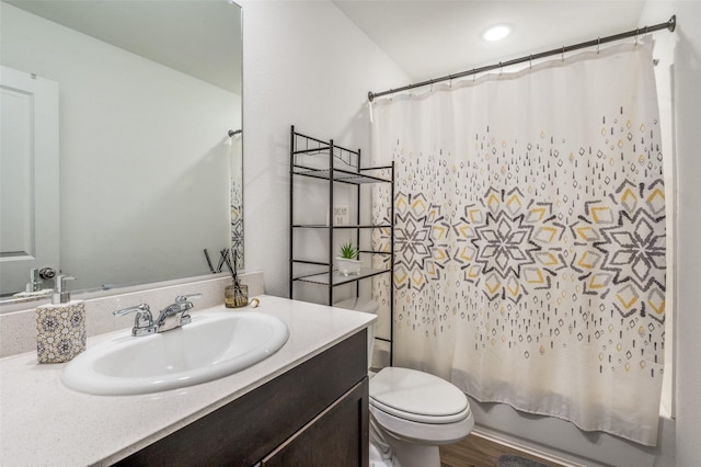 3113 Harper St, Little Elm, TX 75068 - bathroom featuring toilet, vanity, shower / bath combination with curtain, and recessed lighting