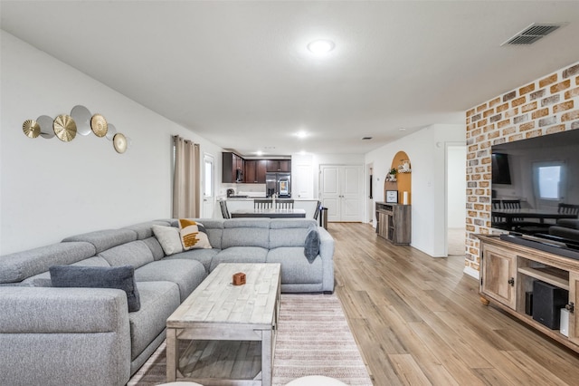3113 Harper St, Little Elm, TX 75068 - living area featuring light wood-style floors and recessed lighting