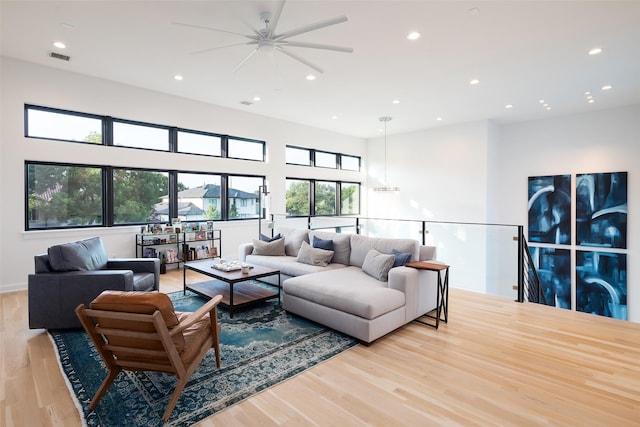 6420 Azalea Ln, Dallas, TX 75230 - living room with recessed lighting, light wood-style floors, and a ceiling fan