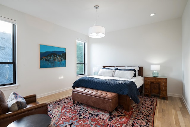 6420 Azalea Ln, Dallas, TX 75230 - bedroom with light wood finished floors, baseboards, and recessed lighting