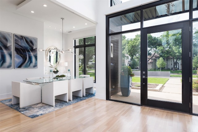 6420 Azalea Ln, Dallas, TX 75230 - doorway to outside with wood finished floors, recessed lighting, baseboards, and a towering ceiling