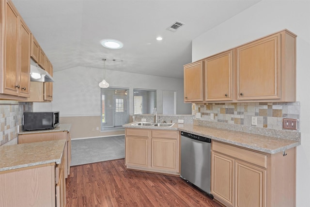 1100 Cedarcrest Dr, Mesquite, TX 75149 - kitchen with stainless steel dishwasher, a sink, light brown cabinetry, black microwave, and a peninsula