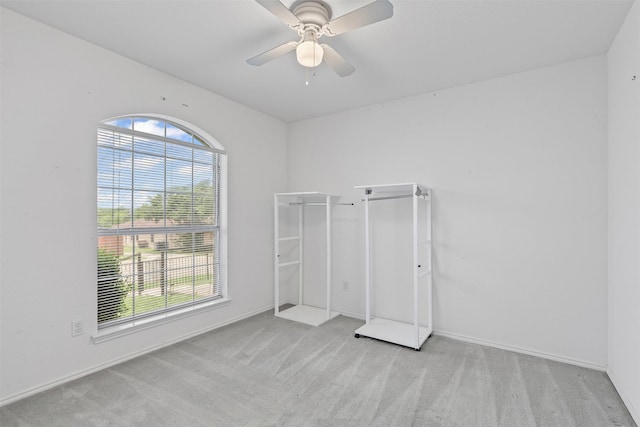 1100 Cedarcrest Dr, Mesquite, TX 75149 - unfurnished bedroom with carpet flooring, a ceiling fan, and baseboards