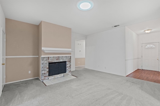 1100 Cedarcrest Dr, Mesquite, TX 75149 - unfurnished living room with carpet flooring, a fireplace with flush hearth, and baseboards