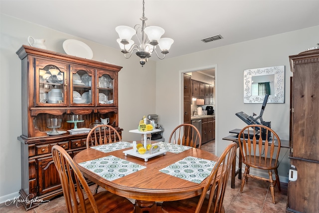 9804 W Trails End, Shreveport, LA 71118 - dining space featuring a chandelier and baseboards