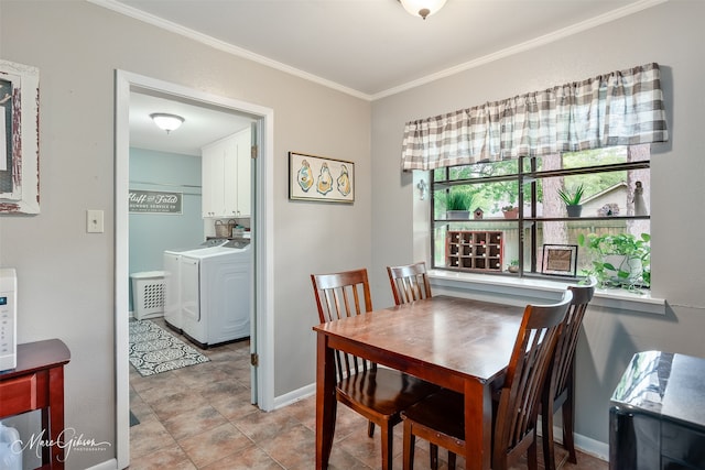 9804 W Trails End, Shreveport, LA 71118 - dining area with washing machine and dryer, crown molding, and baseboards