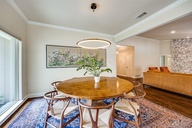 6616 Elvedon Dr, Dallas, TX 75248 - dining space featuring wood finished floors, ornamental molding, and baseboards