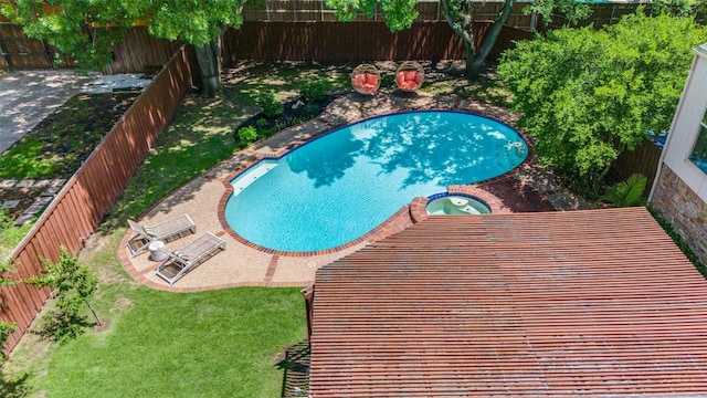 6616 Elvedon Dr, Dallas, TX 75248 - view of swimming pool with a pool with connected hot tub and a patio area