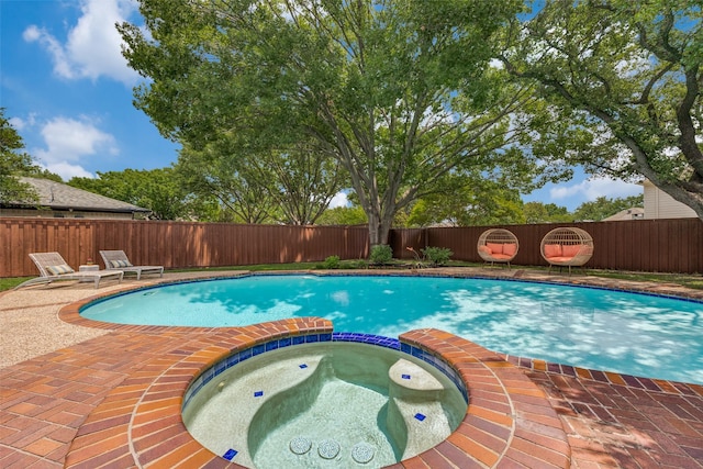 6616 Elvedon Dr, Dallas, TX 75248 - view of pool featuring a fenced backyard, a pool with connected hot tub, and a patio area