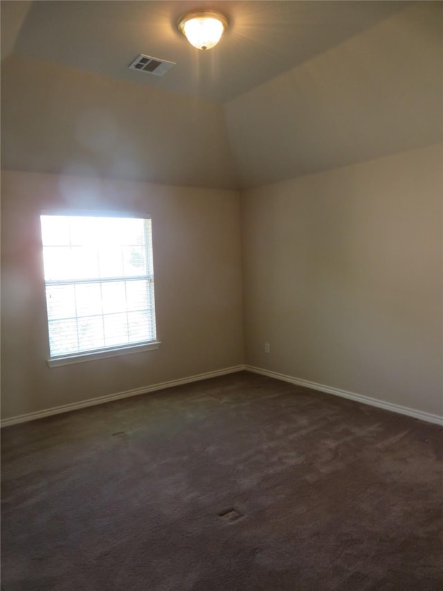 1501 Mountain Laurel Ln, Desoto, TX 75115 - additional living space featuring dark colored carpet, vaulted ceiling, and baseboards