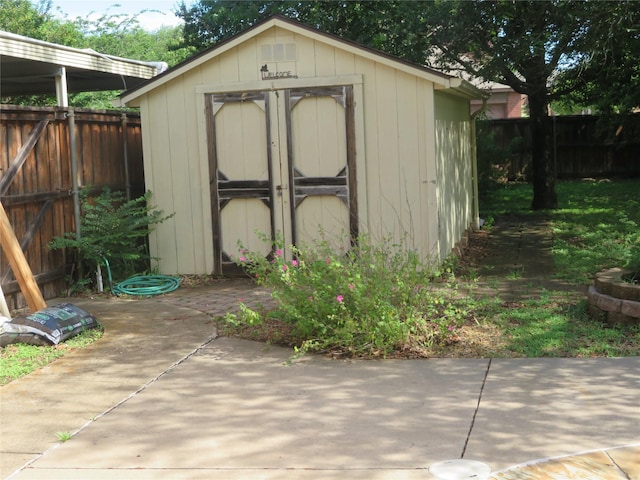 1501 Mountain Laurel Ln, Desoto, TX 75115 - view of shed featuring a fenced backyard