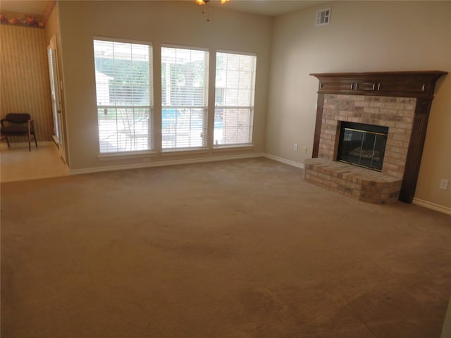 1501 Mountain Laurel Ln, Desoto, TX 75115 - unfurnished living room featuring carpet, baseboards, and a fireplace