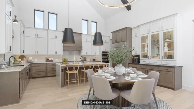 712 Bear Creek Dr, Hurst, TX 76054 - dining room featuring high vaulted ceiling and light wood-style flooring