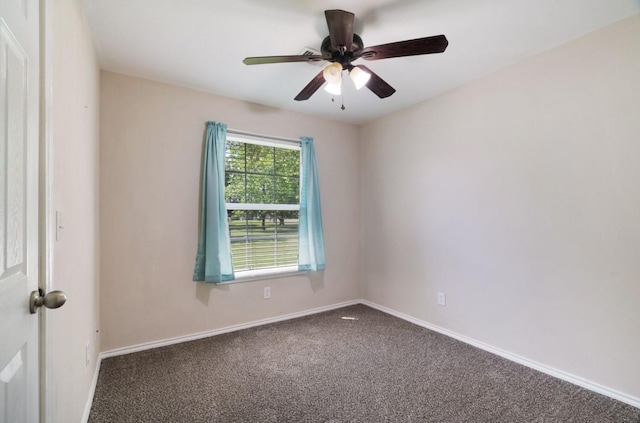 6650 Pine Mill Rd, Reno, TX 75462 - spare room featuring carpet floors, baseboards, and ceiling fan
