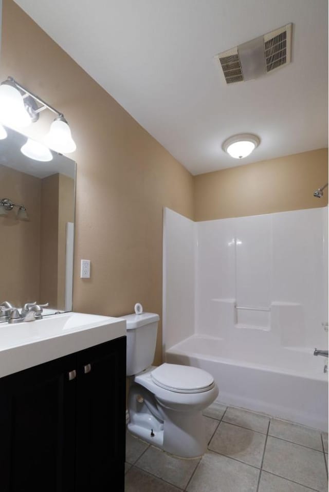 6650 Pine Mill Rd, Reno, TX 75462 - full bath with tile patterned floors, vanity, toilet, and shower / bathtub combination