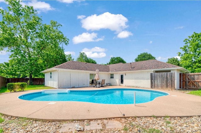 6650 Pine Mill Rd, Reno, TX 75462 - view of swimming pool with a patio and a fenced backyard