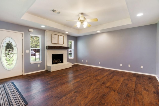 6650 Pine Mill Rd, Reno, TX 75462 - unfurnished living room with a tray ceiling, a ceiling fan, healthy amount of natural light, and recessed lighting