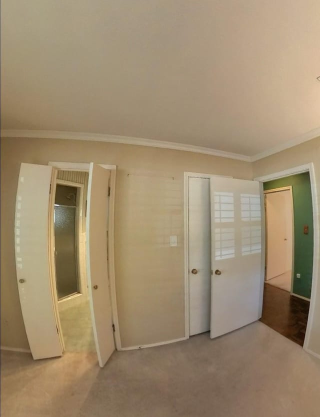5805 Azteca Dr, Fort Worth, TX 76112 - unfurnished bedroom with ornamental molding, carpet flooring, baseboards, and a closet