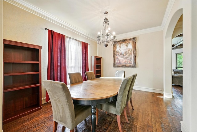 49 Pristine Pond Dr, Frisco, TX 75034 - dining space with a chandelier, arched walkways, crown molding, and wood finished floors