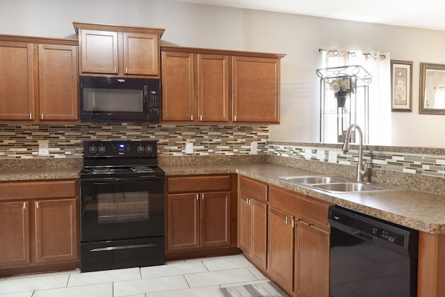 1204 Bluff View Dr, Hutchins, TX 75141 - kitchen featuring black appliances, a sink, brown cabinetry, light tile patterned floors, and decorative backsplash