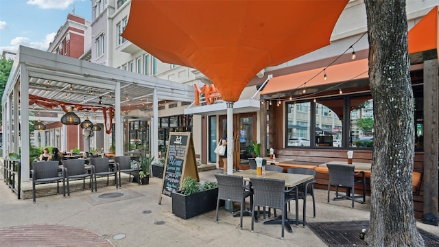 3901 Travis St Unit 230, Dallas, TX 75204 - view of patio / terrace featuring outdoor dining space