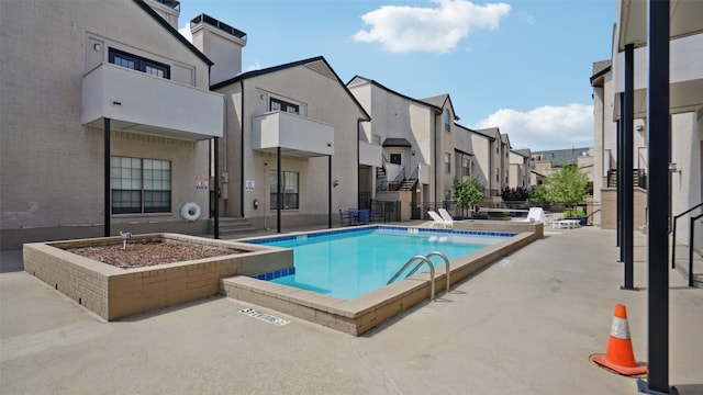 3901 Travis St Unit 230, Dallas, TX 75204 - community pool with a residential view