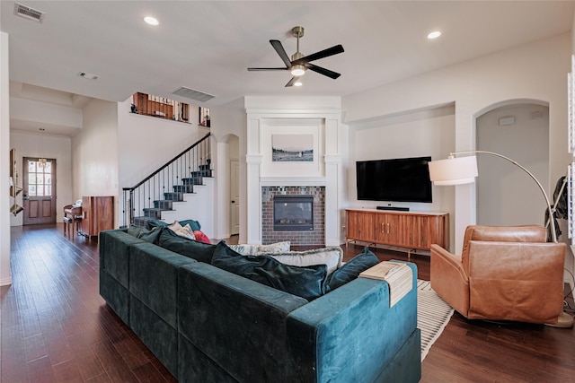 4300 Round Valley Ln, Fort Worth, TX 76262 - living area featuring ceiling fan, dark wood-type flooring, stairs, a tile fireplace, and recessed lighting