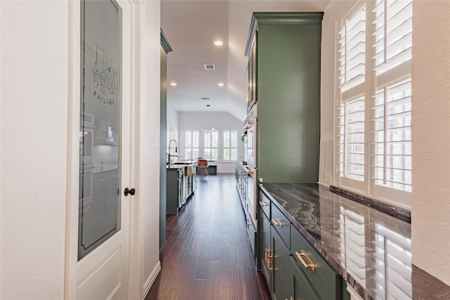 4300 Round Valley Ln, Fort Worth, TX 76262 - hall with dark wood-style floors, lofted ceiling, recessed lighting, and a sink