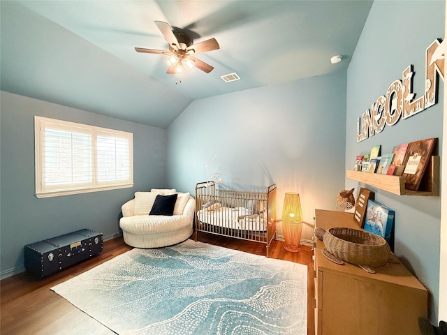4300 Round Valley Ln, Fort Worth, TX 76262 - bedroom with wood finished floors, lofted ceiling, a ceiling fan, and baseboards